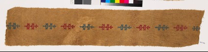 Textile fragment with stylized plantsfront