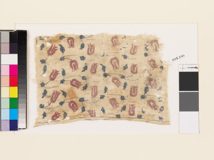 Textile fragment with tulips, leaves, and stemsfront
