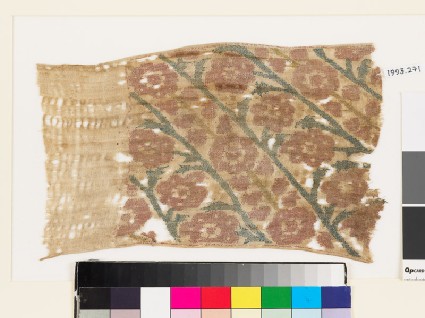 Textile fragment with flowers, buds, and leaves, probably from a sash or scarffront