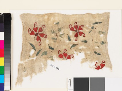 Textile fragment with plants, tendrils, and leavesfront