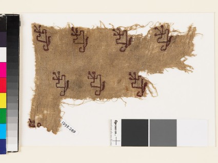 Textile fragment with floral shapesfront