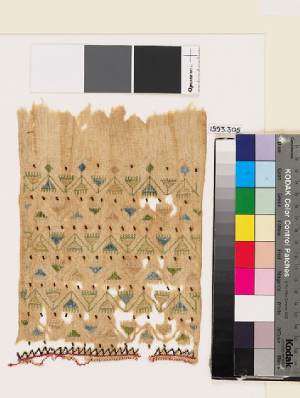 Textile fragment with chevron stems, triangular flowers, and zigzagfront