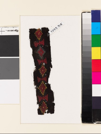 Textile fragment with diamond-shapes and trianglesfront