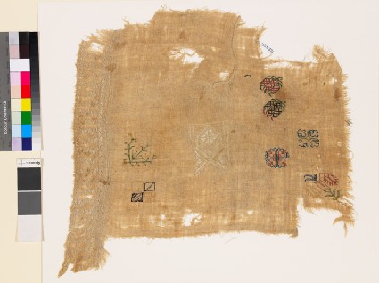 Sampler fragment with flowering plants, geometric whitework, and chevronsfront