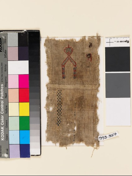 Textile fragment with V-shape, geometric band, and check pattern, probably from a samplerfront