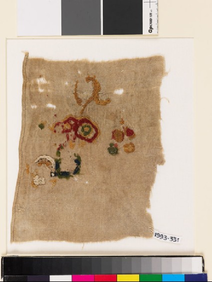Textile fragment with incomplete floral shapesfront