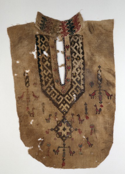 Part of a tunic front with geometric pattern and birdsfront