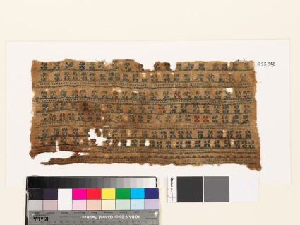 Textile fragment with bands of diagonal crossesfront