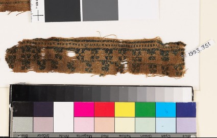 Textile fragment with bands of diagonal crossesfront