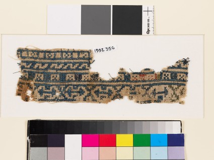 Textile fragment with bands of arrowheads, squares, and Z-shapesfront