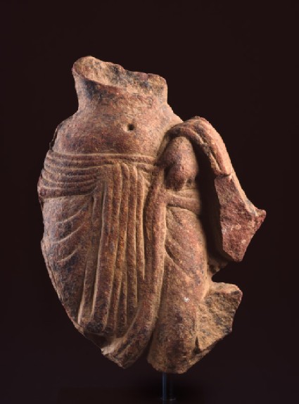 Fragment of a female figurefront