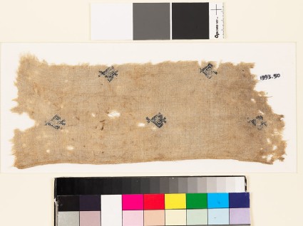 Textile fragment with diamond-shaped medallions and palmettesfront