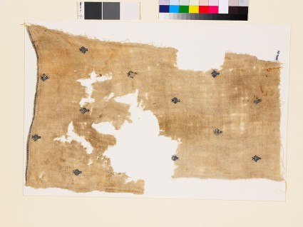 Textile fragment with diamond-shaped medallions and palmettesfront
