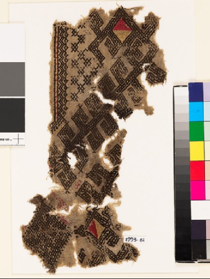 Textile fragment from the neck of a garment with hooks and diamond-shapesfront