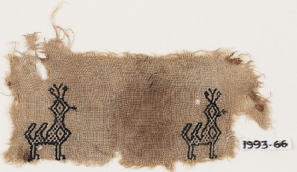 Textile fragment with two peacocksfront