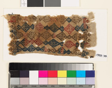 Textile fragment with linked diamond-shapes and palmettes, probably from a beltfront