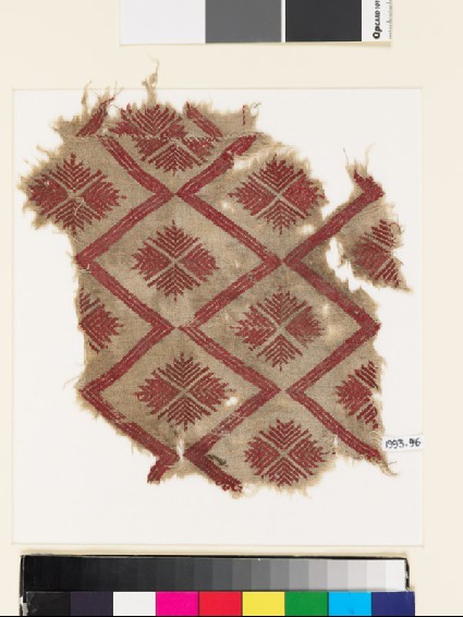Textile fragment with chevron and cruciform rosettesfront