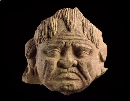 Head of a grimacing yaksha, or nature spiritfront