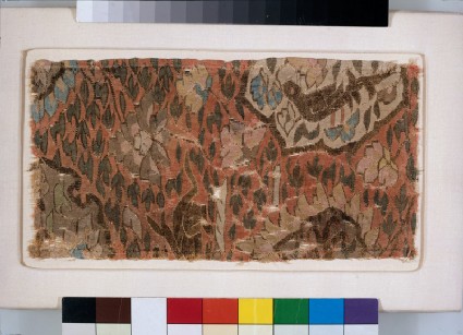 Tapestry fragment with bird, beast, and peoniesfront