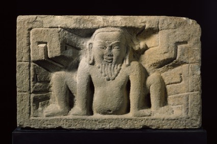 Stone slab with yaksha, or nature spirit, in relieffront