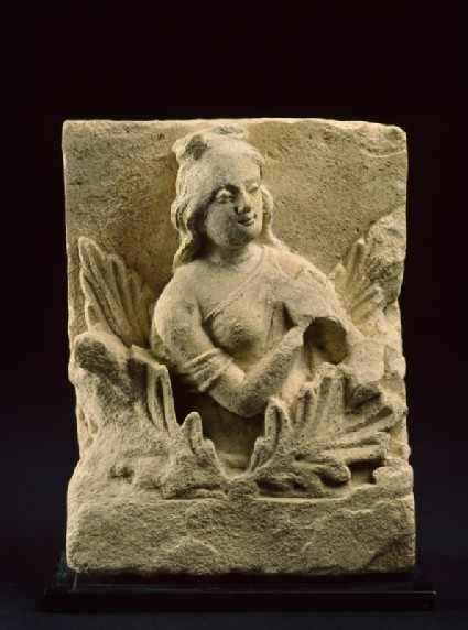 Frieze fragment depicting a female attendant among acanthus leavesfront