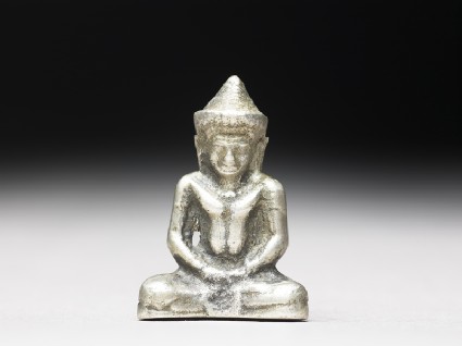 Silver amulet in the form of the Buddhafront