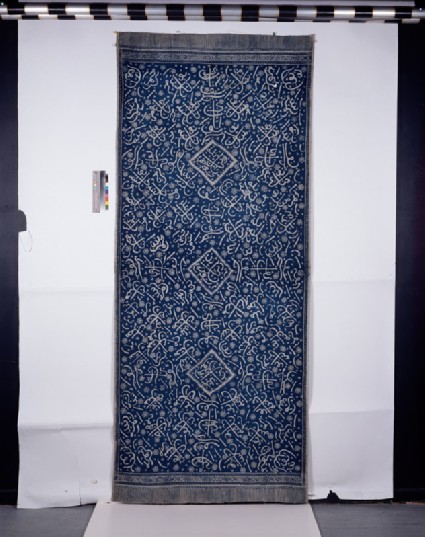 Hiasan dinding, or ceremonial wall hanging, with Islamic calligraphic and floral decorationfront
