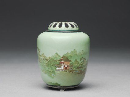 Incense burner, or kōro, with an entrance gate amid treesside