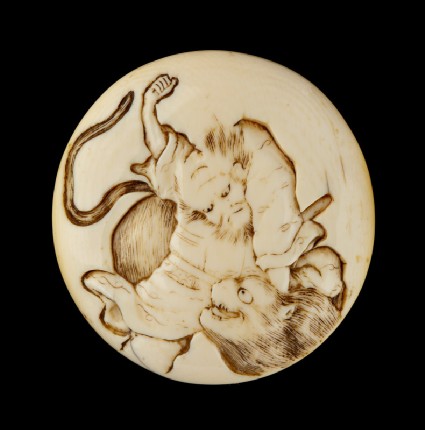 Manjū netsuke depicting Sanbushō fighting a tigerfront