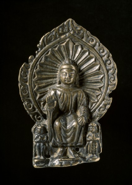 Seated figure of the Buddha with attendantsfront