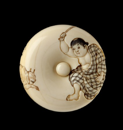 Manjū netsuke depicting a boy chasing away two oni, or demonsfront