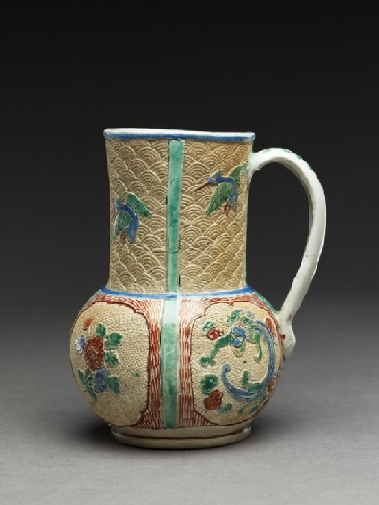 Mug of European form with dragons, flowers, and birdsside
