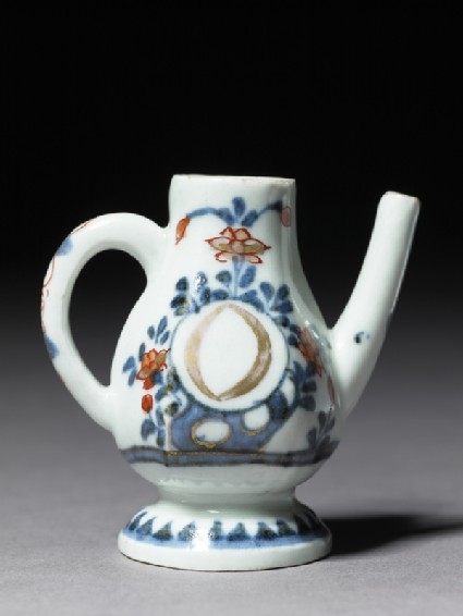 Miniature oil ewer marked with the letter 'O'side