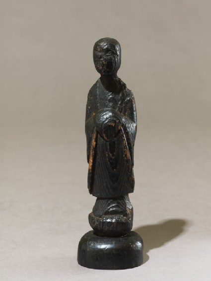 Standing Buddhist figureoblique