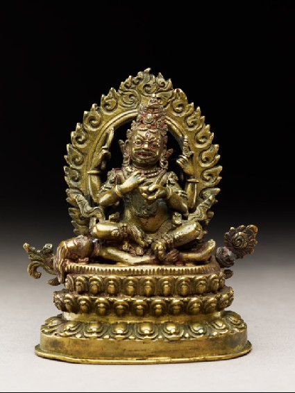 Figure of Mahakala seated on a corpse upon a lotus-petalled thronefront