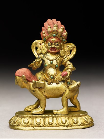 Figure of a male deity seated on a human-faced animalside