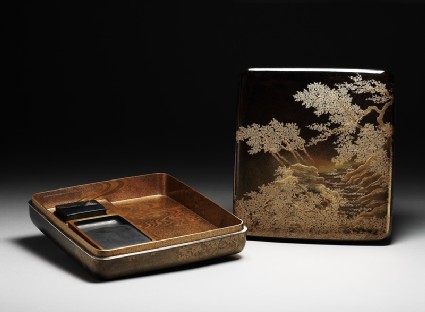 Suzuribako, or writing box, with cherry trees on a river bankoblique, open