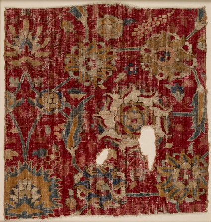 Mughal carpet fragment with scrolling vines and blossomsfront