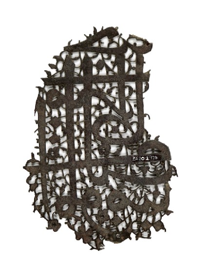 Fragment of a plaque with openwork decorationfront