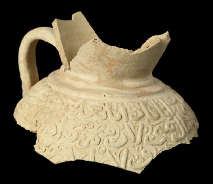 Fragments of a filter jug with openwork decorationfront