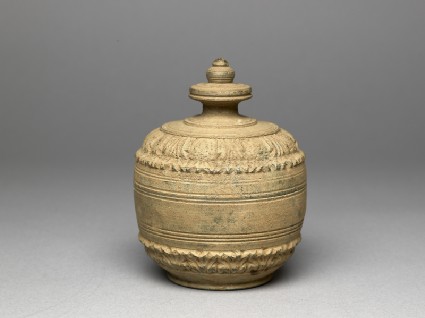 Lidded reliquary containing votive offeringsoblique