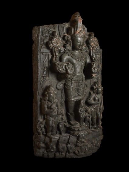 Stele with Surya, the Sun god, and attendantsside