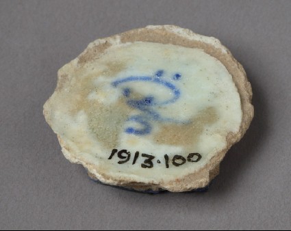 Base fragment of a bowl with inscriptionfront