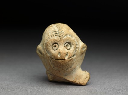 Terracotta head of a monkeyfront