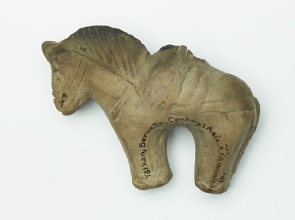 Terracotta figure of a horse and riderfront