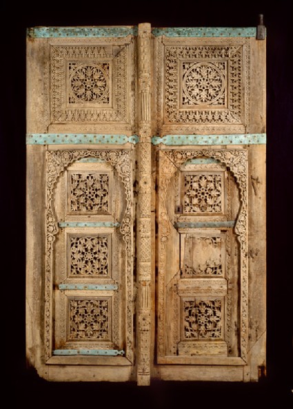 Wooden doors with floral decorationfront