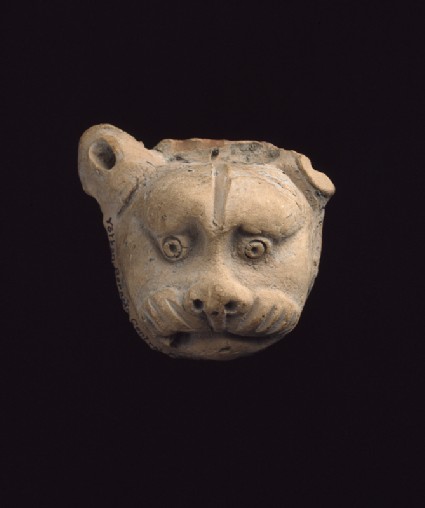 Lion mask from a vasefront