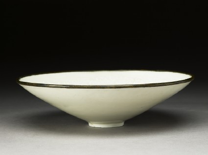 White ware dish with floral decorationoblique