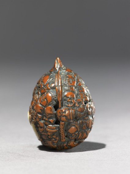 Netsuke with masksside