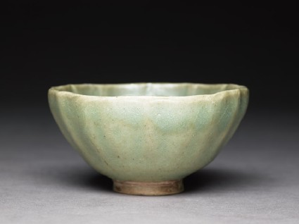 Greenware bowl with fluted sidesoblique
